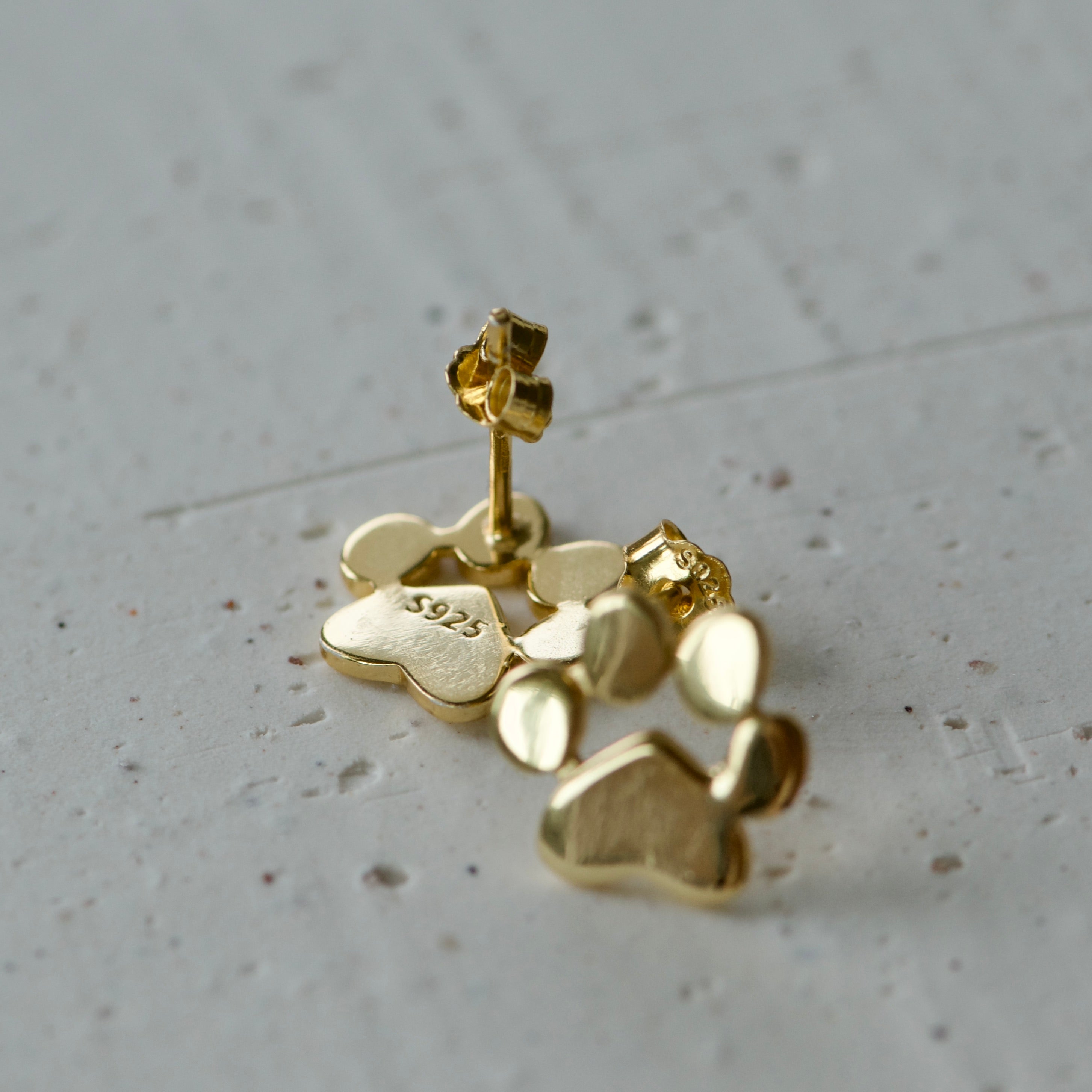 Gold Dog paw stud earrings