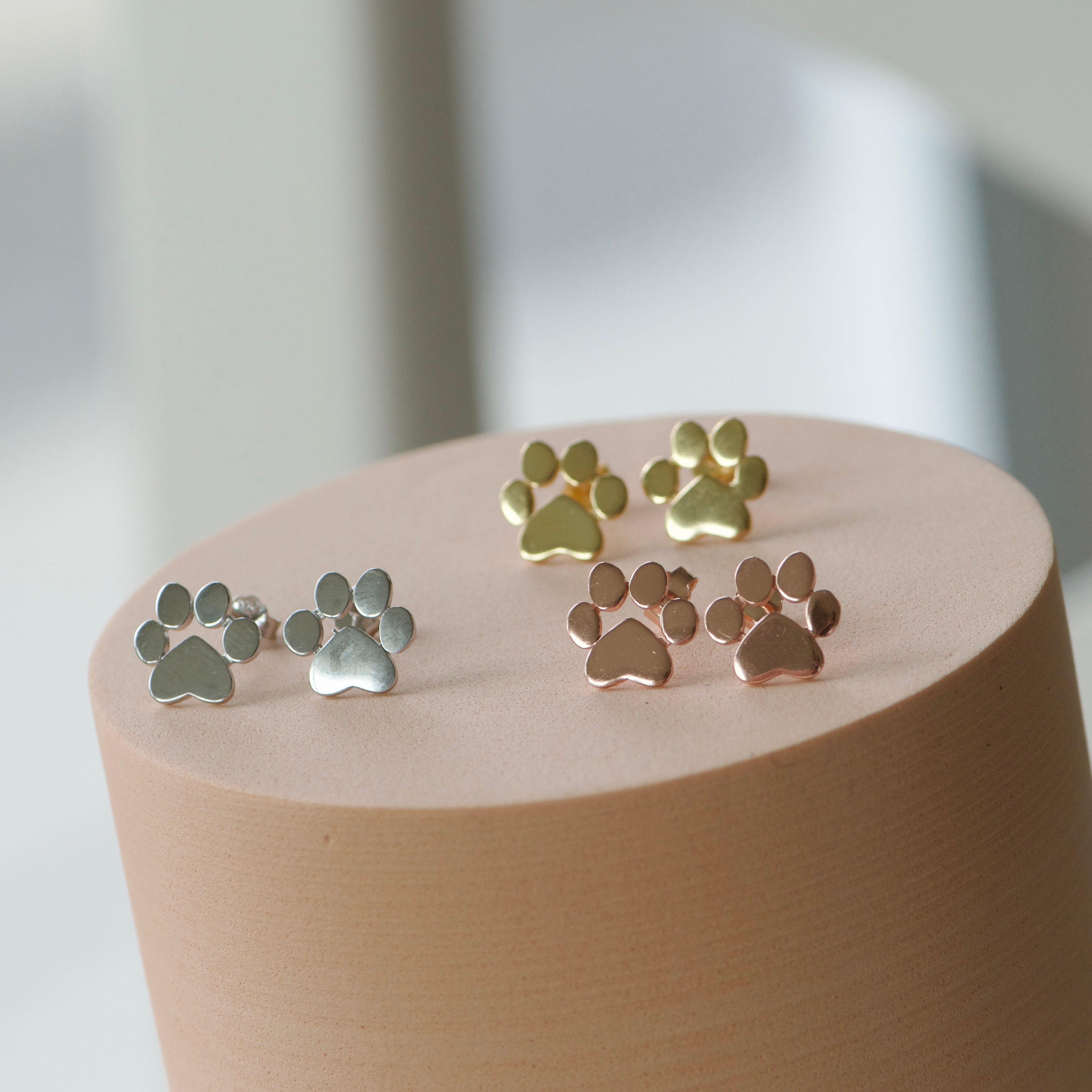 Dog paw stud earrings