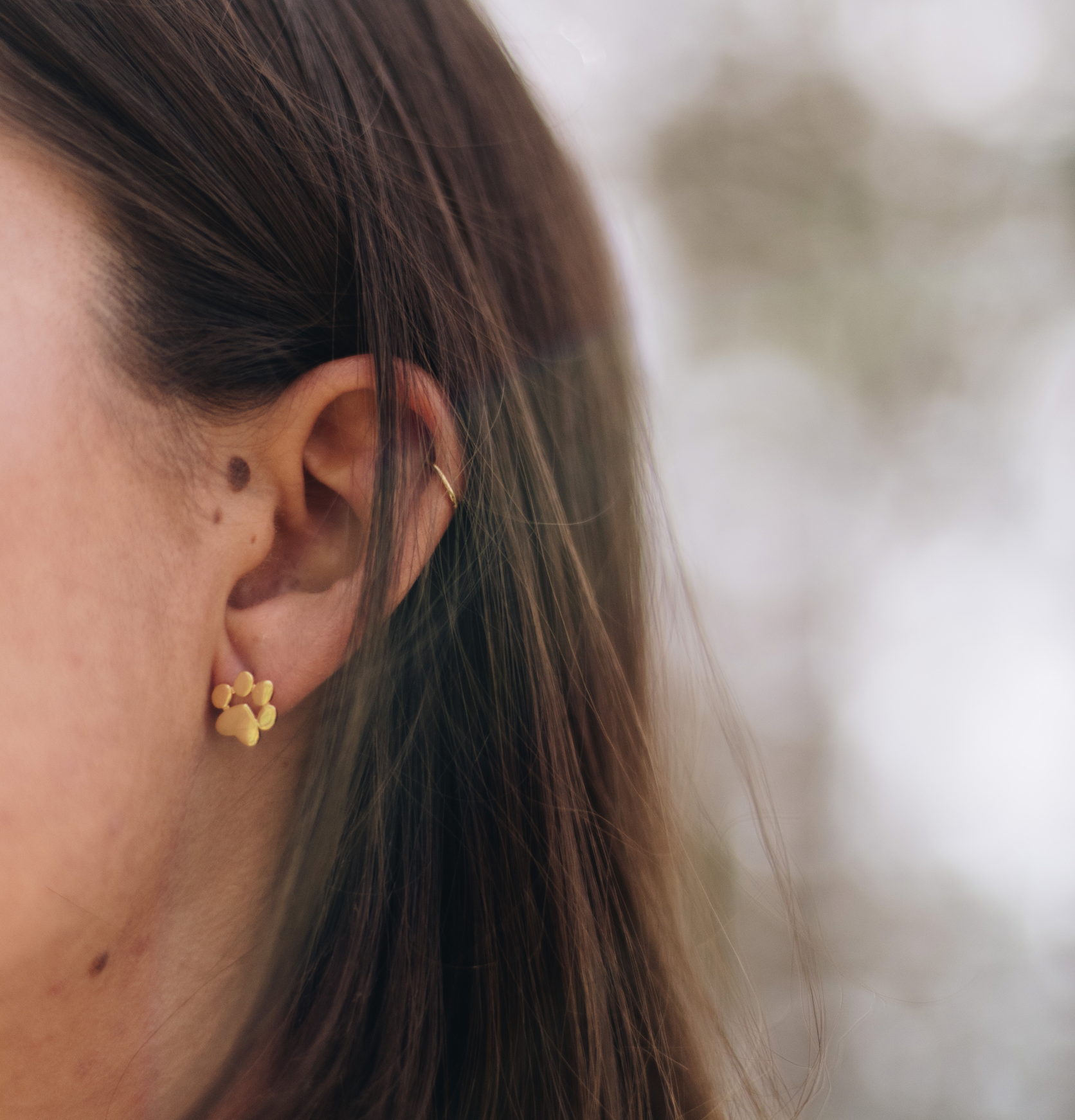 Gold Dog paw stud earrings