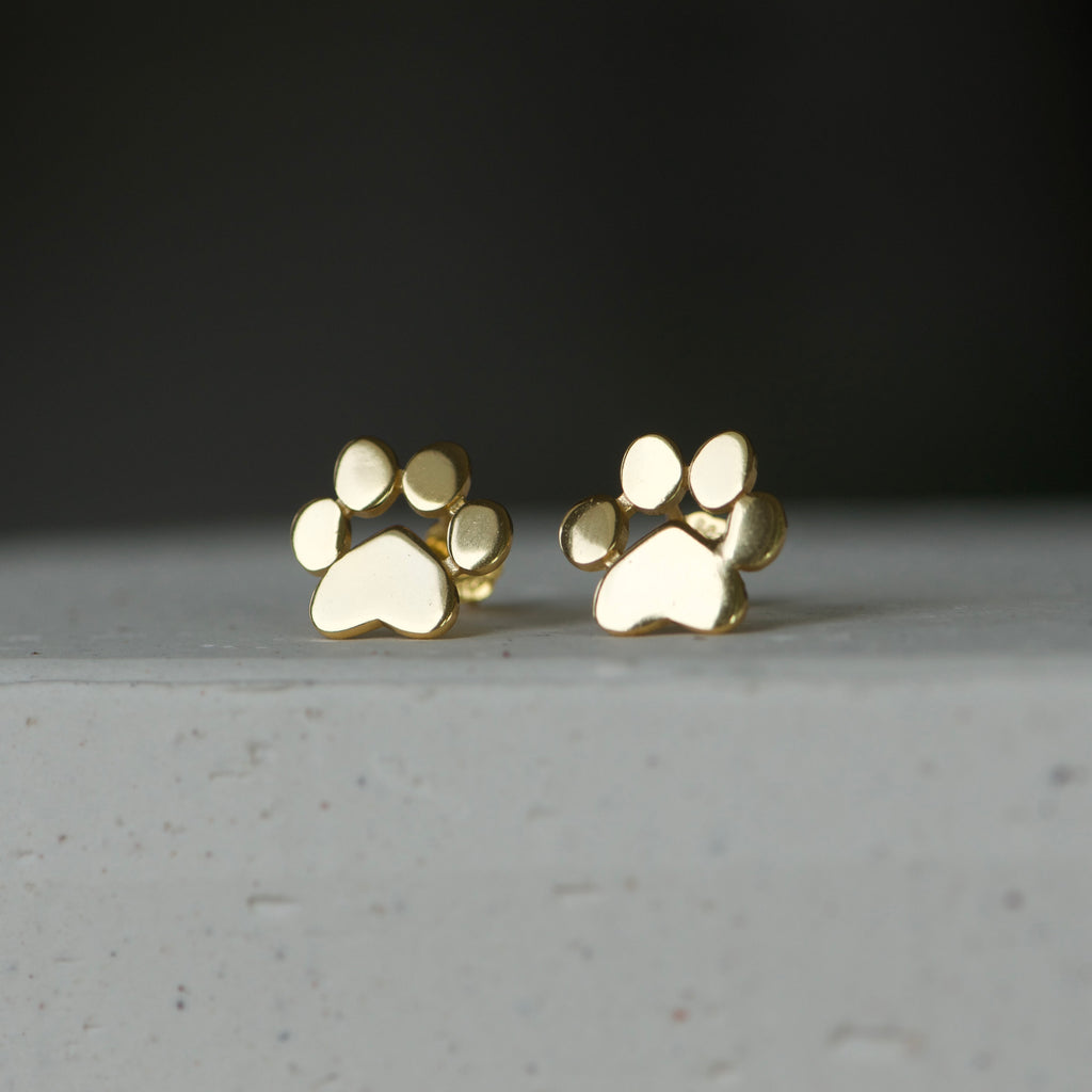 Gold Dog paw stud earrings